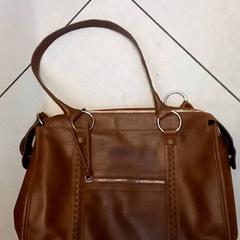 Táska Brown, amint azt Leonardo Royal Hotel Amsterdam az iLost segítségével jelentette.