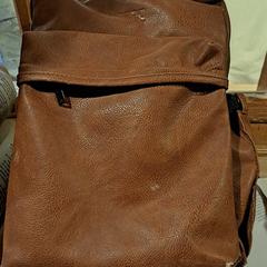 Bruin (nep) leer rugzak met baby spullen, ha sido reportado a iLost
