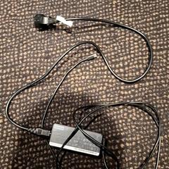 Carregador de computador portátil Lenovo, como reportado por Van der Valk Hotel Utrecht utilizando o iLost