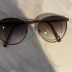 Sunglasses brown, as reported by Fjord Line - Fjord FSTR using iLost