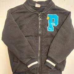 Veste zwart Puma, come riportato da Avonturenpark Hellendoorn utilizzando iLost