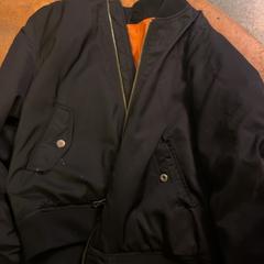 Jas Black orange inside, zoals gemeld door KABUL à GoGo / Teatro met iLost