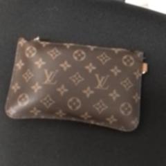 Clutch bag EKANGA NSAME, as reported by ilévia using iLost