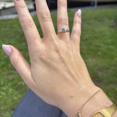 Verloren armband goud met blauw steen, som rapporterats till iLost