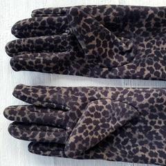 Guanti Panterprint, come riportato da DierenPark Amersfoort utilizzando iLost