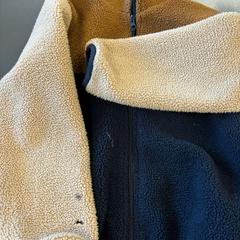 Fleece kinderjas, amint azt Gebo Tours az iLost segítségével jelentette.