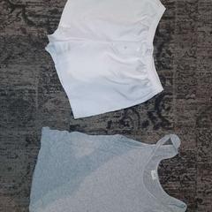 Kleding Grijze top en witte shorts, zoals gemeld door Van der Valk Rotterdam Blijdorp met iLost