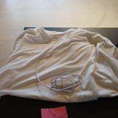 Tshirt and charger, as reported by Conscious Hotel Westerpark using iLost