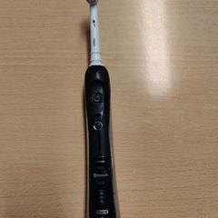 Toothbrush Black Grey and White, as reported by The Dominican using iLost