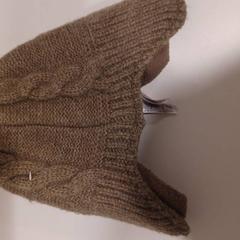 Muts de lana beige, zoals gemeld door RÍO Shopping - Valladolid met iLost