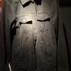 Jaqueta Denim zwart, segons ha informat Club Nyx/Exit Café mitjançant iLost