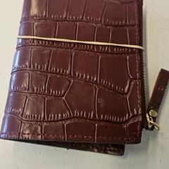 Peňaženka Amenchar, ako bolo nahlásené GVB pomocou iLost