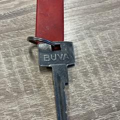 sleutel met rode label, segons s'ha informat a iLost