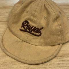 Kids hat, Tan, says 'Royal' on the front in brown がiLostで IKEA Sylvia Park によって報告されました