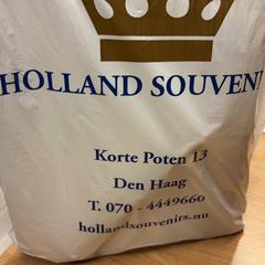 Borsa Plastic tas met 2 flessen drank, come riportato da Pathé Spuimarkt utilizzando iLost