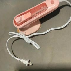 Mini iron Pink, segons ha informat MEININGER Hotel Salzburg City Center mitjançant iLost