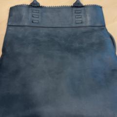 Bolso de mano, ha sido reportado por RET con iLost