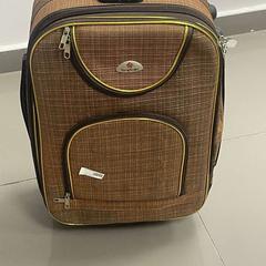 Bag & Travel bag بني  بخط زهبي, as reported by محطة بريدة (بريدة) using iLost