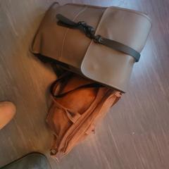 Grey backpack and leather bag, as reported to iLost