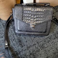 Borsetta Tuberquia, come riportato da Connexxion Haarlem IJmond utilizzando iLost