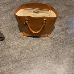 Taška, jak nahlášeno Gemeente Amsterdam pomocí iLost