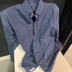 القميص BLUE، كما تم الإبلاغ عنه بواسطة Room Mate Bruno عبر iLost