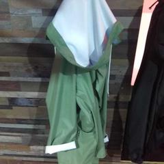 Olive green coat white inside, gemeldet von The End Karaoke Groningen über iLost