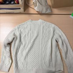 Sweater White knit sweater, as reported by DoubleTree by Hilton Rotterdam Centre using iLost