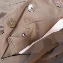 Blazer kaki, como reportado por TCL utilizando o iLost