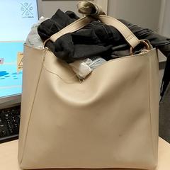 Saco - Lederen tas, como reportado por Centraal magazijn utilizando o iLost