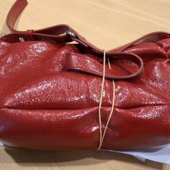 Tas Tas rood, zoals gemeld door Gemeente Gooise Meren met iLost