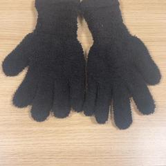 Guanti Zwart, come riportato da Pathé Amsterdam Noord utilizzando iLost