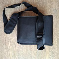 Zwarte verrekijker in tasje, as reported to iLost