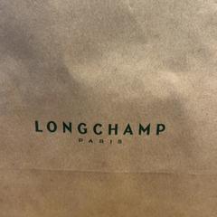 Aankoop longchamp, rapporterat av Designer Outlet Roermond med iLost