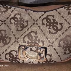 Guess handtas, iLost-i jakinarazi zaion moduan