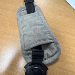 Gordel kinderstoel bruin en zwart, ha sido reportado por VITAZ campus Sint-Niklaas con iLost