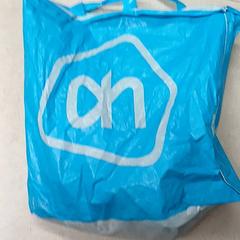 Sacchetto di plastica Albert Hein, come riportato da Qbuzz GD Groningen Peizerweg utilizzando iLost