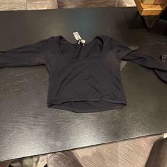 Lange mouwen t-shirt zwarte shirt met mouwen, as reported by Van der Valk Hotel Amsterdam-Amstel using iLost