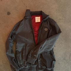 Jas Grijze iriedaily jas met roze binnenvoering, as reported by Panama Amsterdam using iLost