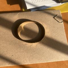 Goud ( kleurige) slavenarmband met sterretjes, as reported to iLost
