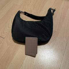 Bolsa negra pequeña / Zwarte schouder tas klein, som rapporterats till iLost