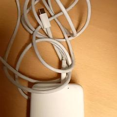 Electronics White apple charger, as reported by Mövenpick Hotel Amsterdam City Centre using iLost