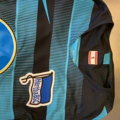 Plecak black and white, zgłoszono przez MEININGER Hotel Leipzig Hauptbahnhof przy użyciu iLost