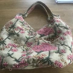 Tas met kralen, rozetn, gerapporteerd met iLost