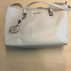 Dámská kabelka, jak nahlášeno RET pomocí iLost