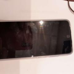 Cellulare gris REDMI, come riportato da TCL utilizzando iLost