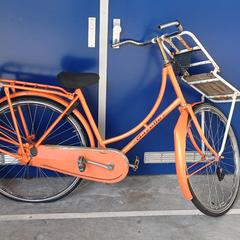 Bicicleta feminina Gazelle oranje Basic omafiets, segundo informou Gemeente Heusden usando iLost