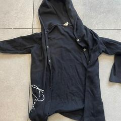 Jakke zwart, som rapportert av Van Heugten Tours ved bruk av iLost