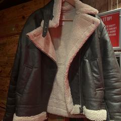Jacket, as reported by Club Nyx/Exit Café using iLost