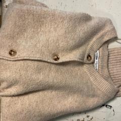 Gilet Pull &Bear, a été signalé par Artis utilisant iLost
